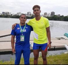 Carlos Andriel junto a su timonel Joan de Paula en el clasificatorio de río de Janeiro. Fotos: Tomadas de Tele Rebelde.