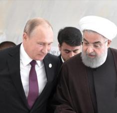 El presidente ruso, Vladimir Putin, (izq.) y su par iraní, Hasan Rohani, en una cumbre en Aktau, Kazajistán, 12 de agosto de 2018. Foto: Reuters.